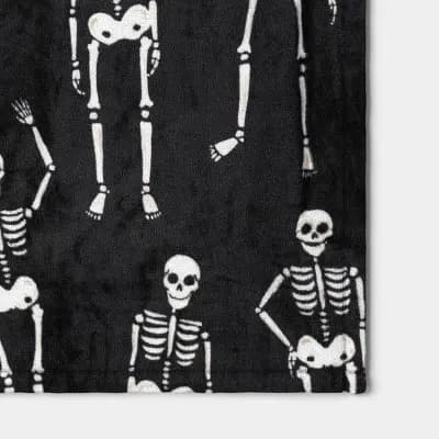 Hyde and EEK! Boutique Halloween Skeletons Throw Blanket Black/Ivory - Hyde and EEK! Boutiqueâ„¢ [100% Recycled Polyester, Lightweight Fabric, M2AMMDX36]