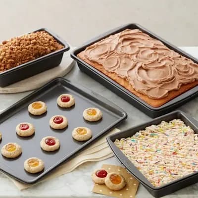 Wilton Ultra Bake Pro 4pc Bakeware Set: Nonstick Carbon Steel Baking Pan & Sheet, Dishwasher-Safe, Silver [Nonstick Coating, Dishwasher-Safe, Carbon Steel]
