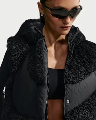 Nike Sportswear Swoosh Series Women's Loose Therma-FIT Hooded Down Vest Black/Black [Faux fur/Panels/Lining: 100% polyester, Machine wash, XS (0–2)-XXL (20–22)]