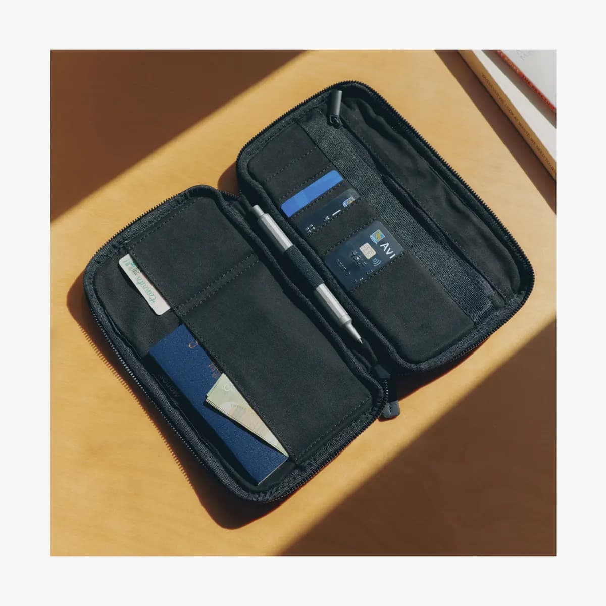 Monos Metro Travel Wallet Carbon Black [Water and scratch-resistant finish, Secured with a zippered main compartment, Lined with soft cotton twill throughout]