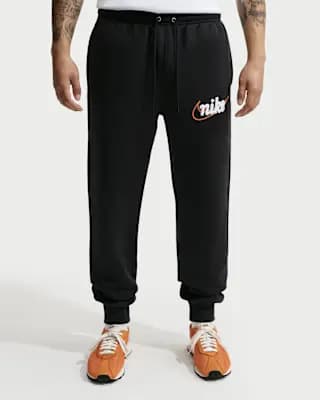 Nike Sportswear Club Men's Fleece Joggers Black/Black/Safety Orange [Body: 80% cotton/20% polyester. Side pocket knuckle side: 100% cotton, Machine wash, XS-4XL Tall]