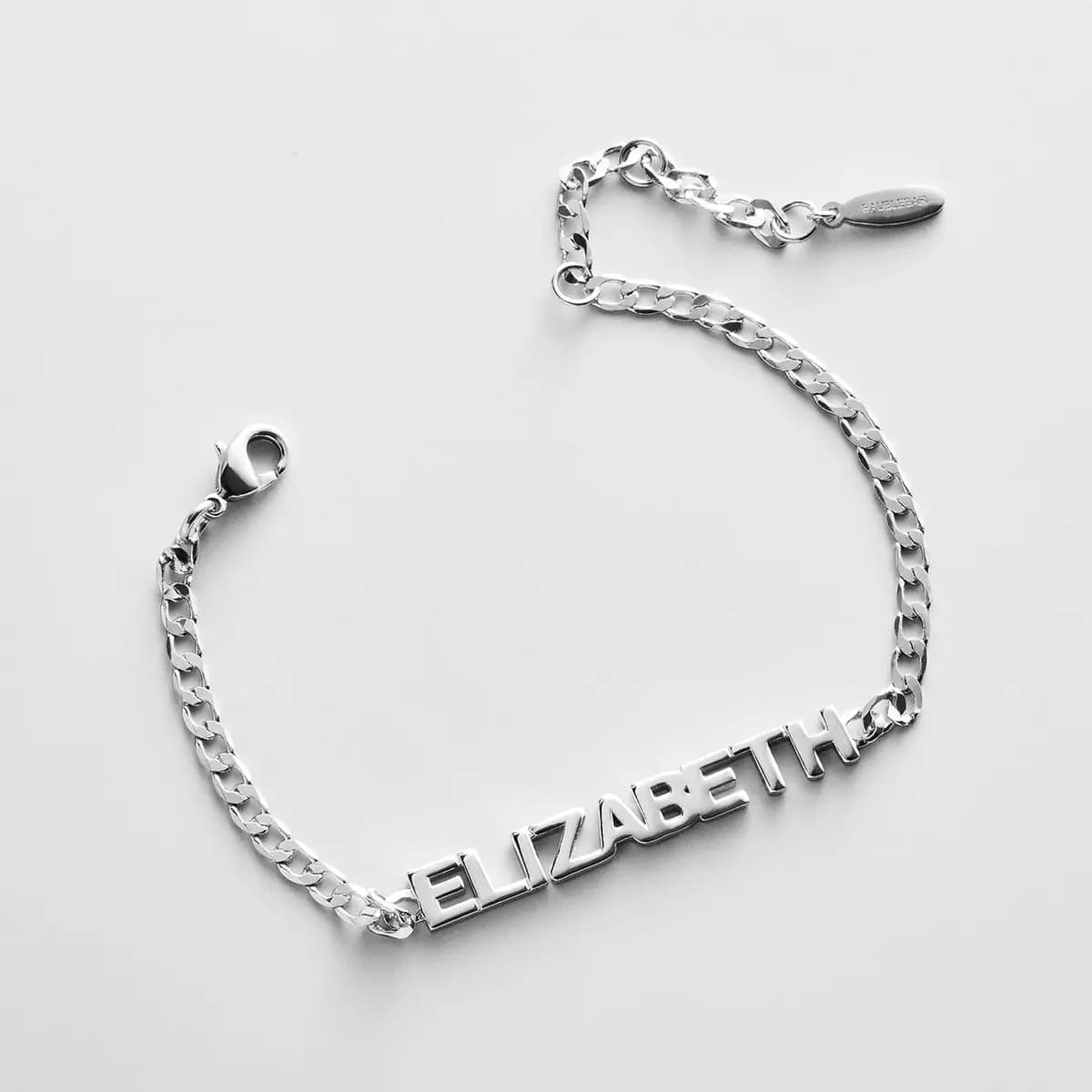 BaubleBar Curb Chain Custom Bracelet - Silver Script [Set on a smooth curb chain, Customize with up to 10 letters in the fon, Available in glossy gold or sleek silver,]