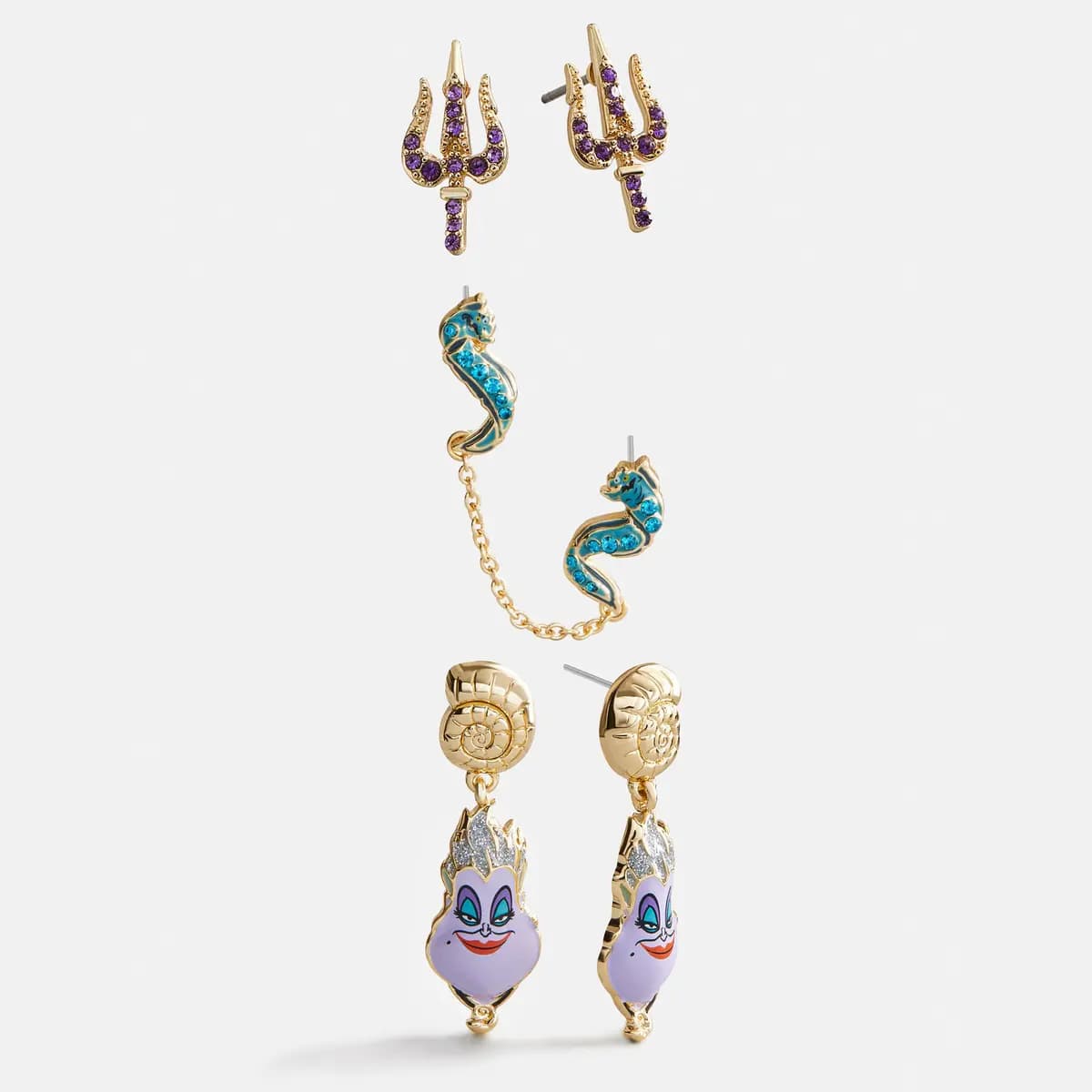 BaubleBar Disney Ursula Earring Set [1 pair of studs featuring Ursula’s trident, 1 pair of drop earrings featuring a gold s, 1 pair of double-piercing earrings featuri]