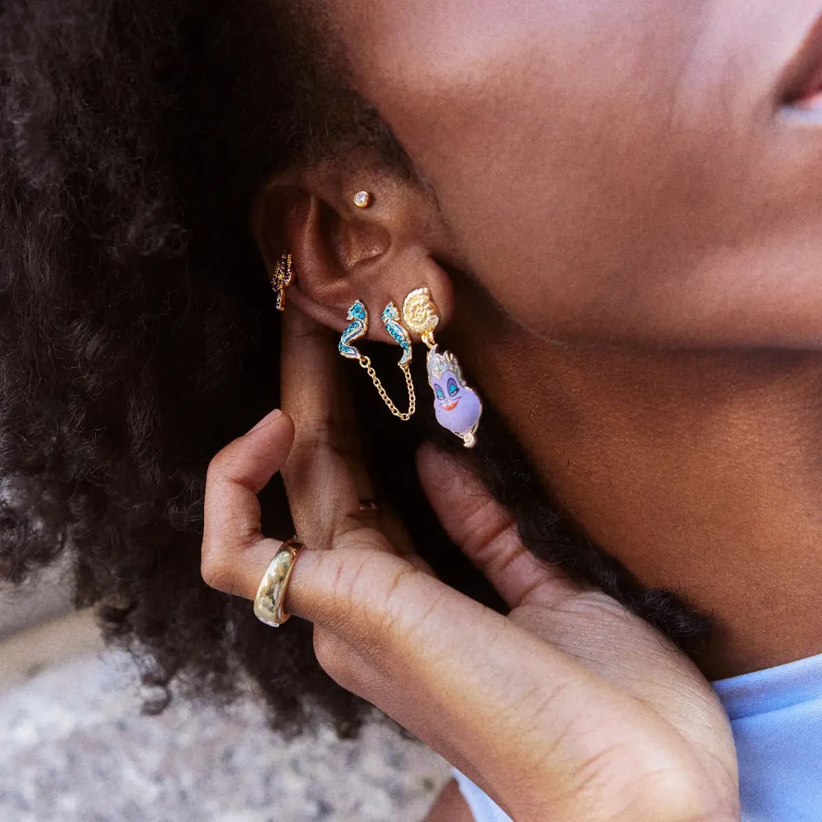 BaubleBar Disney Ursula Earring Set [1 pair of studs featuring Ursula’s trident, 1 pair of drop earrings featuring a gold s, 1 pair of double-piercing earrings featuri]