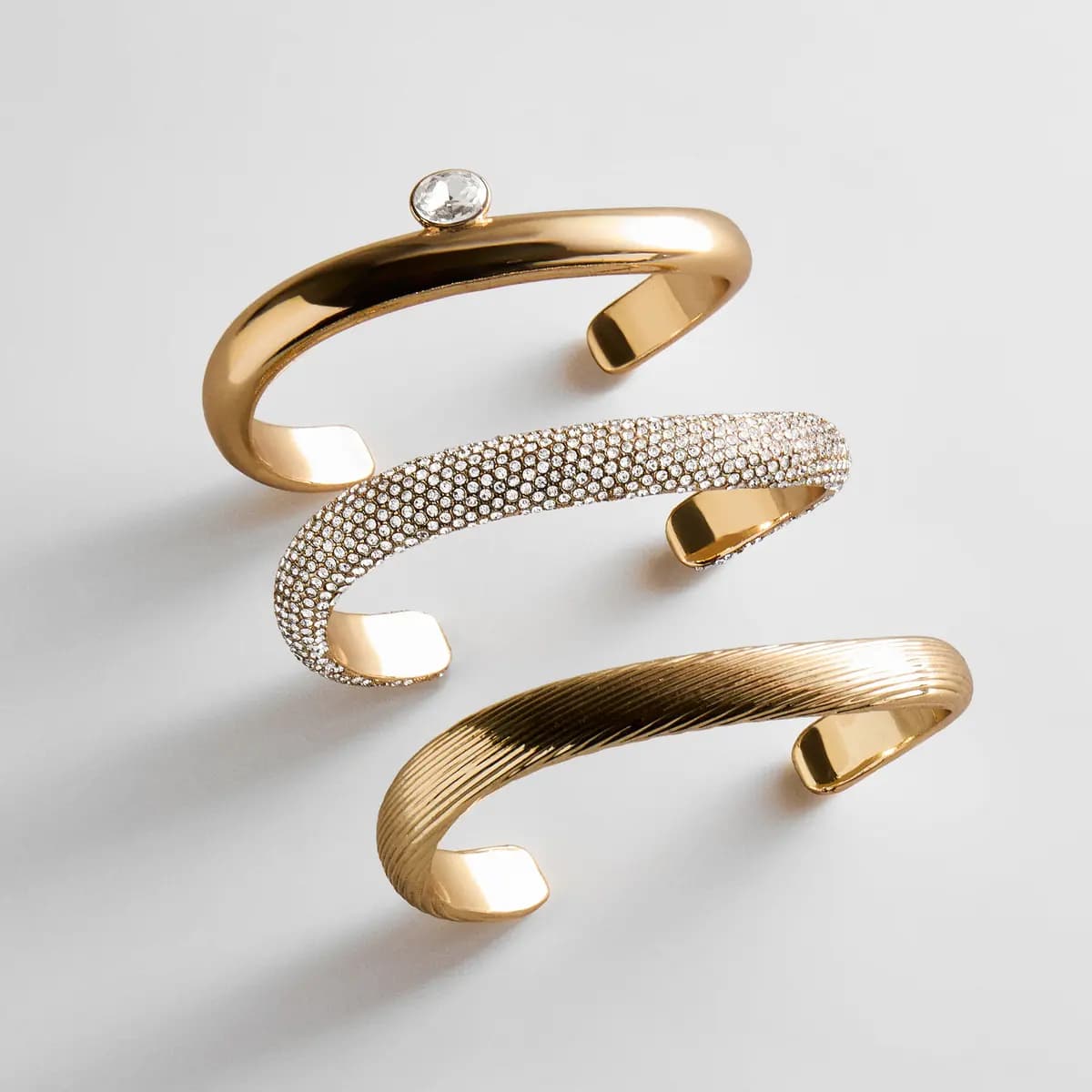 BaubleBar Nicolette Hinge Bangle Bracelet Set [Designed to create an effortlessly layered look, 1 in glossy gold, 1 in bright pavé, and 1, Beautifully crafted with etched detailing