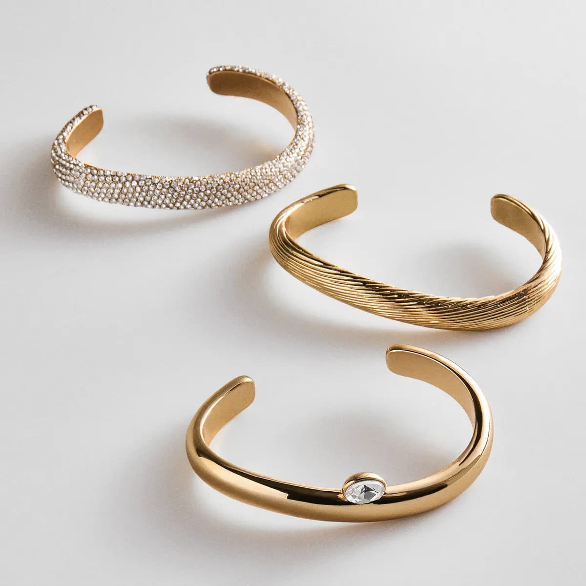BaubleBar Nicolette Hinge Bangle Bracelet Set [Designed to create an effortlessly layered look, 1 in glossy gold, 1 in bright pavé, and 1, Beautifully crafted with etched detailing