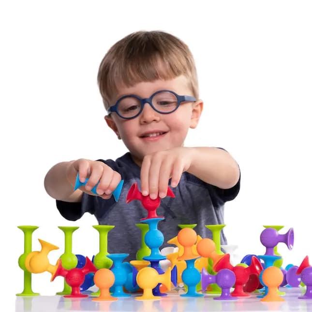 Fat Brain Toys Squigz Silicone Suction-Construction Building Toy for Kids Ages 3 and Up [Starter Set = 24 Pieces, Deluxe Set = 50 Pieces, A lively toy innovation - new Suction Cons