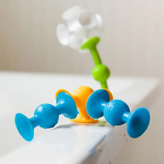 Fat Brain Toys Squigz Silicone Suction-Construction Building Toy for Kids Ages 3 and Up [Starter Set = 24 Pieces, Deluxe Set = 50 Pieces, A lively toy innovation - new Suction Cons