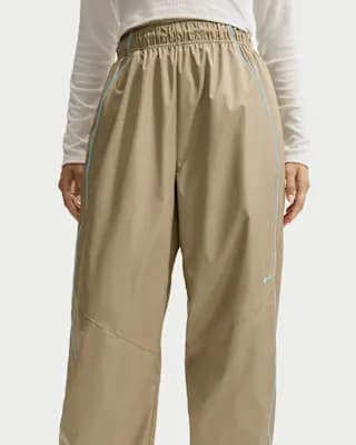 Nike Sportswear Women's Loose High-Rise Track Pants Parachute Beige/Baltic Blue/White [Parachute Beige/Baltic Blue/White, Embroidered Swoosh logo, Hand pockets]
