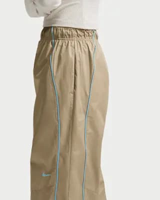 Nike Sportswear Women's Loose High-Rise Track Pants Parachute Beige/Baltic Blue/White [Parachute Beige/Baltic Blue/White, Embroidered Swoosh logo, Hand pockets]