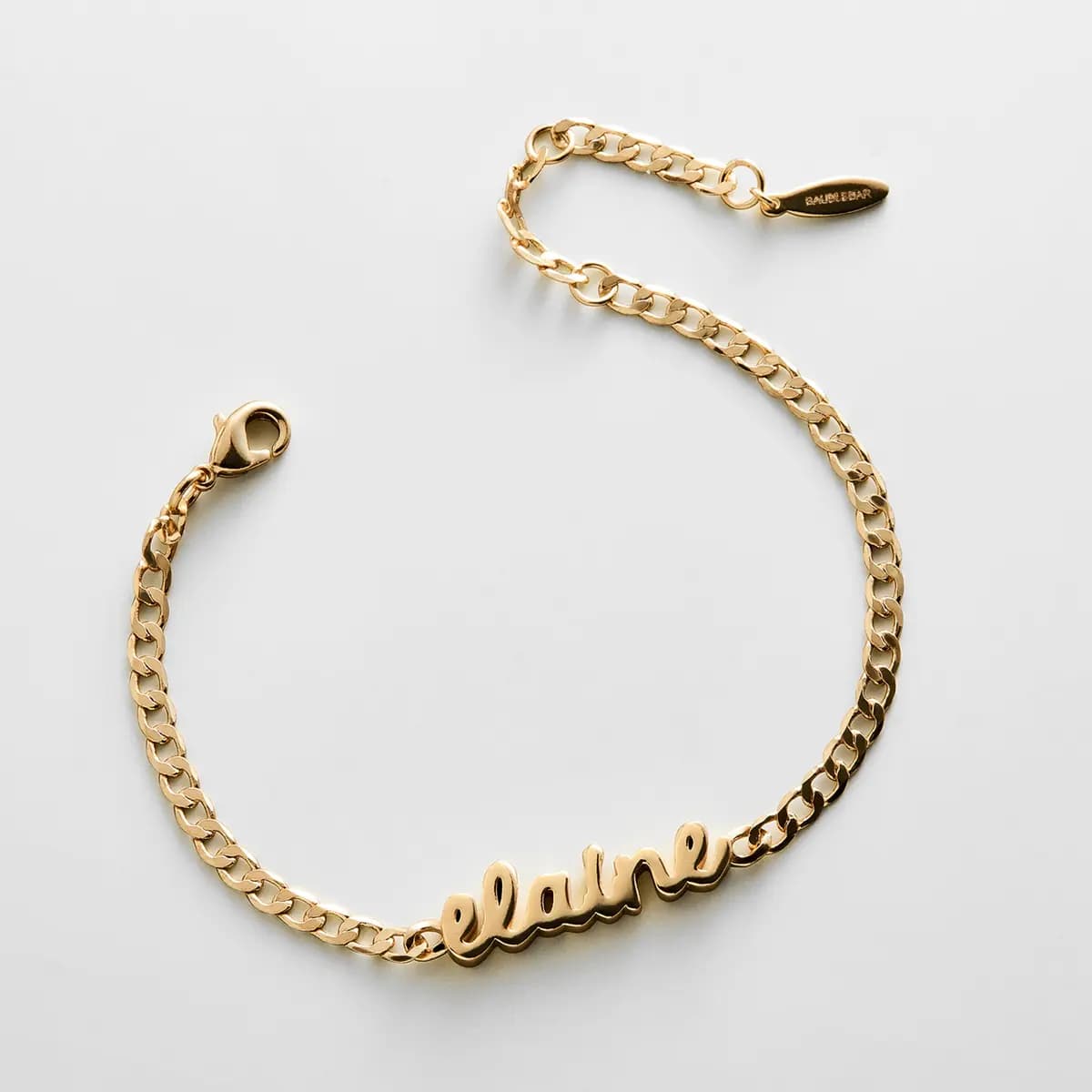 BaubleBar Curb Chain Custom Bracelet - Gold Script [Set on a smooth curb chain, Customize with up to 10 letters in the fon, Available in glossy gold or sleek silver,]