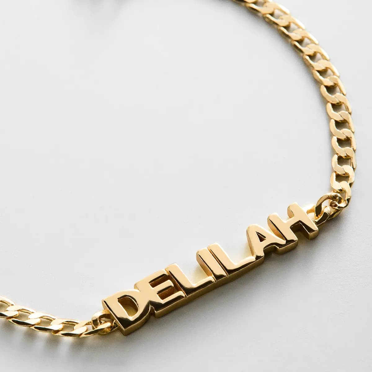 BaubleBar Curb Chain Custom Bracelet - Gold Script [Set on a smooth curb chain, Customize with up to 10 letters in the fon, Available in glossy gold or sleek silver,]