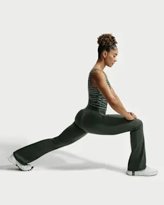Nike One Women's High-Waisted Flared Leggings Camo Green/White [Camo Green/White, Back pocket fits most phones., Swoosh logo]