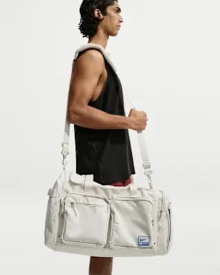 Nike Utility Power 2.0 Duffel Bag (Medium, 51L) Light Orewood Brown/Light Orewood Brown/Indigo Storm [Body: 100% polyester, Spot clean, ONE SIZE]
