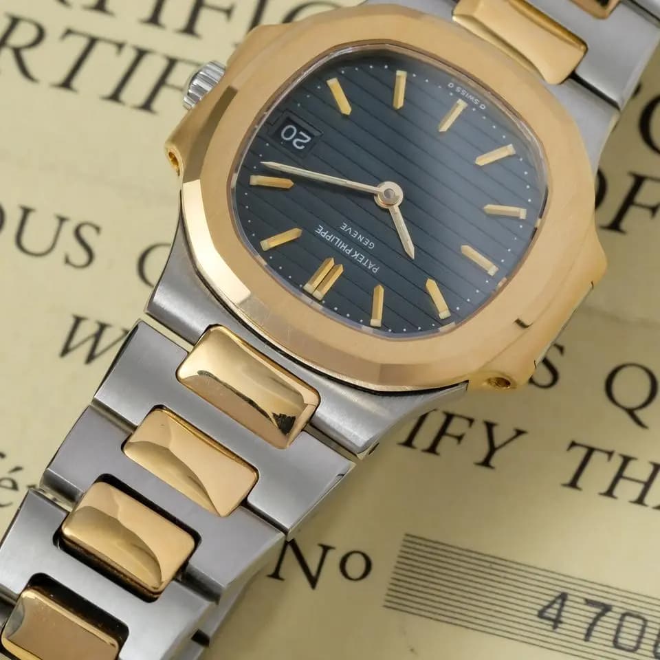 Patek Philippe Nautilus ref. 4700 steel & gold box papers and invoice