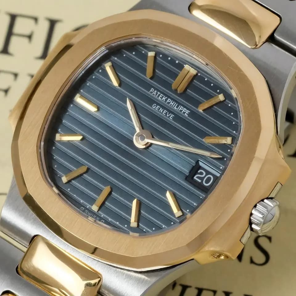 Patek Philippe Nautilus ref. 4700 steel & gold box papers and invoice