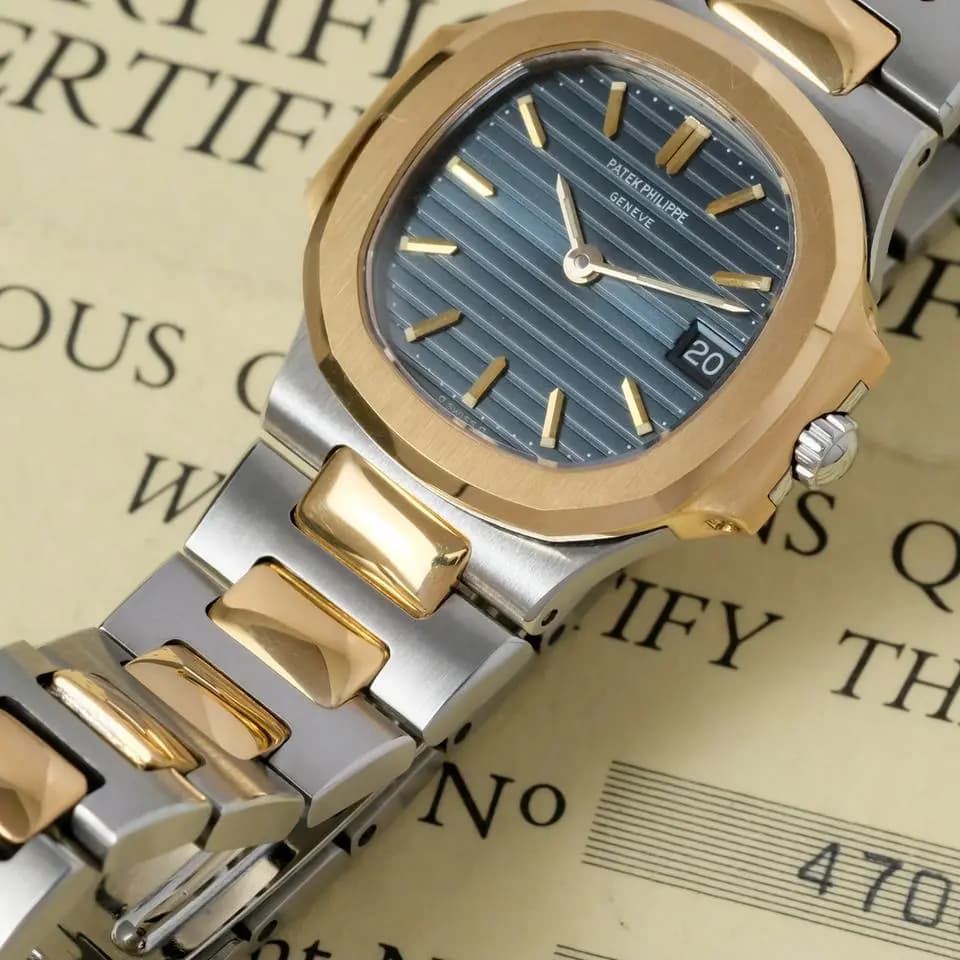 Patek Philippe Nautilus ref. 4700 steel & gold box papers and invoice