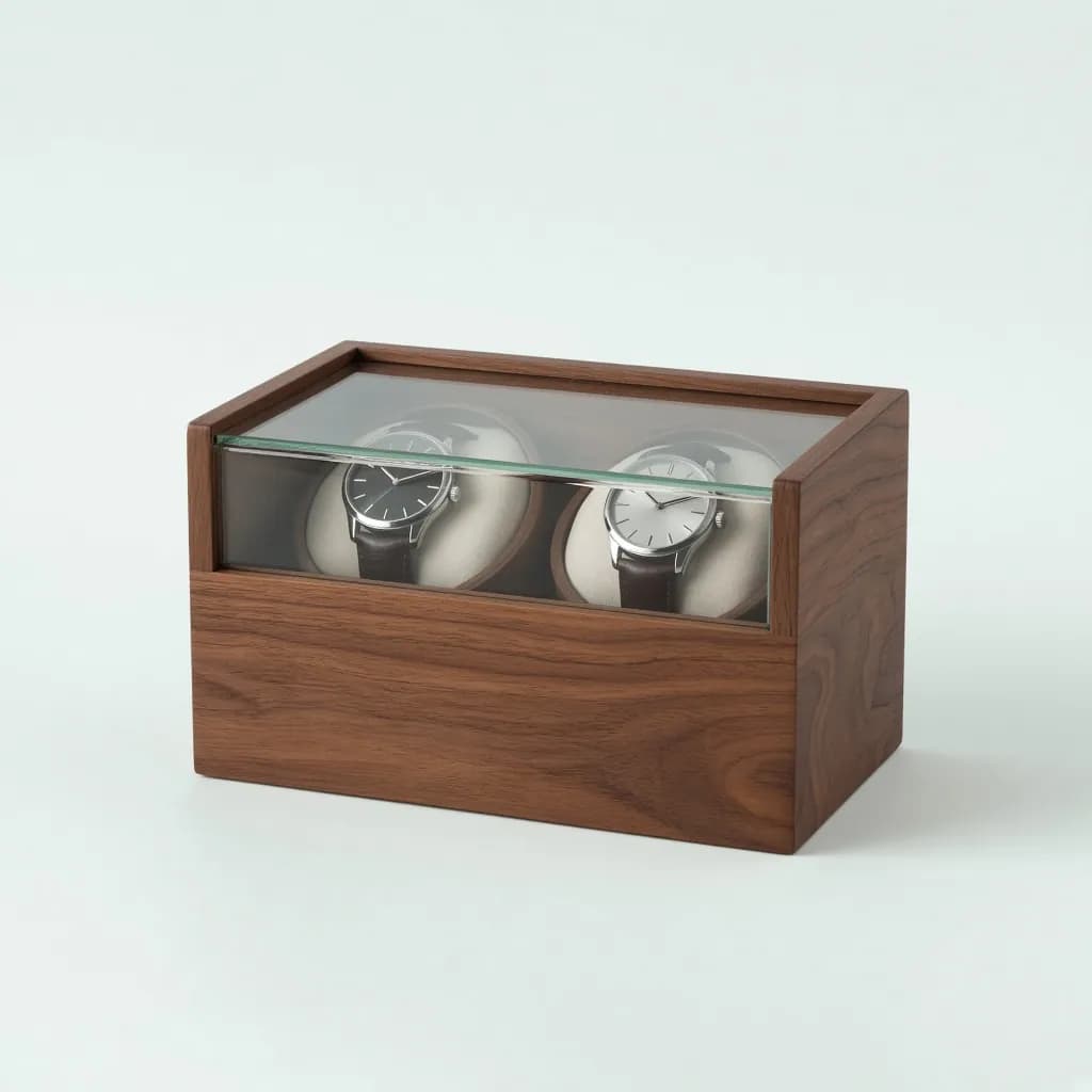 Walnut wood double watch winder box with a glass lid and two cushions holding wristwatches