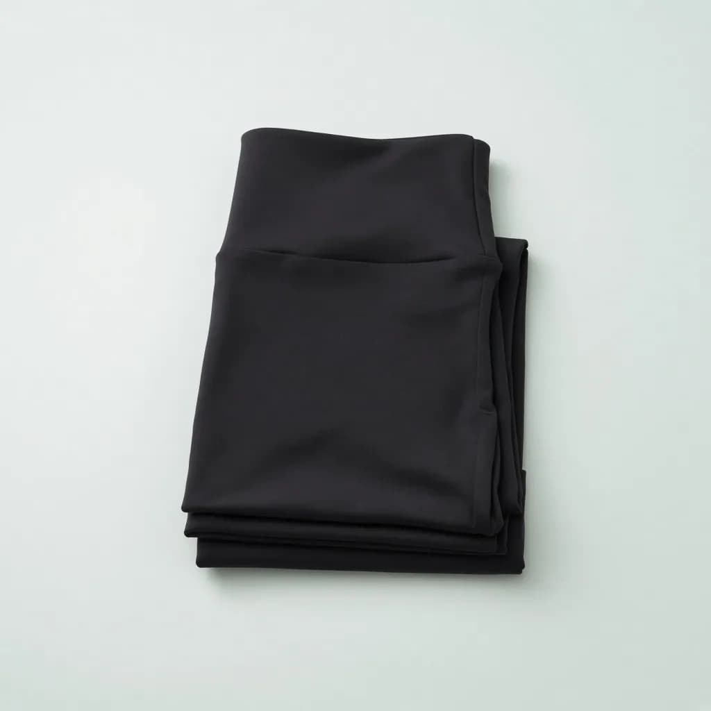 Folded black high-rise athletic leggings